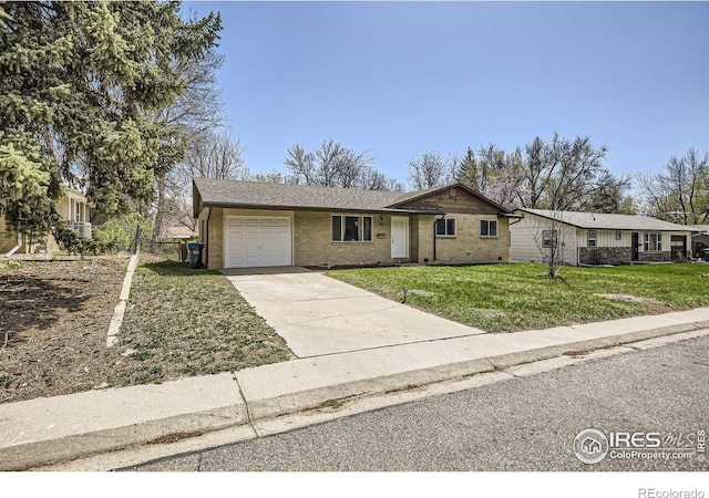 1036 Meadowbrook Dr, Fort Collins, CO 80521 - ranch-style home with an attached garage, driveway, and brick siding