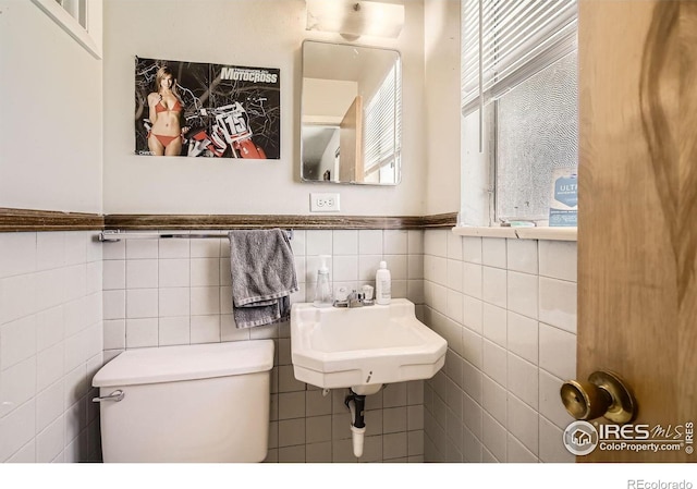 1036 Meadowbrook Dr, Fort Collins, CO 80521 - half bath with tile walls and wainscoting