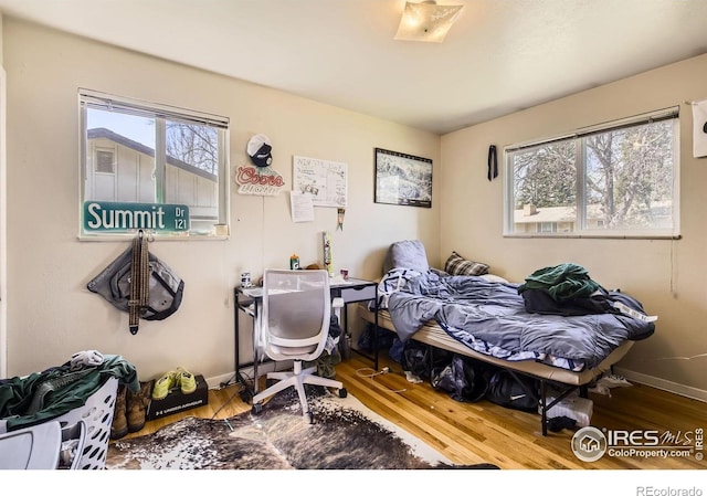 1036 Meadowbrook Dr, Fort Collins, CO 80521 - bedroom with wood finished floors and baseboards