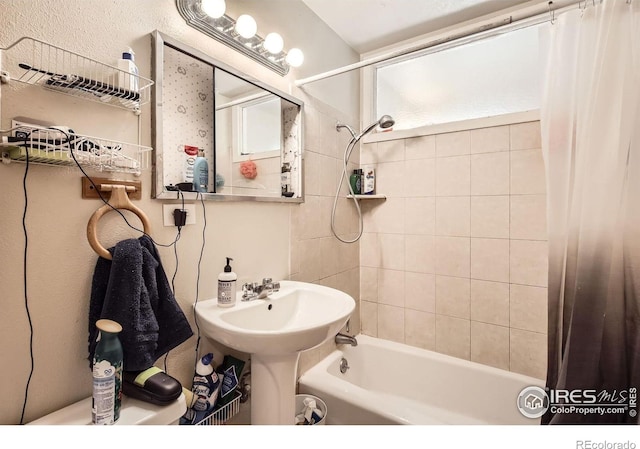 1036 Meadowbrook Dr, Fort Collins, CO 80521 - bathroom featuring shower / bath combo with shower curtain