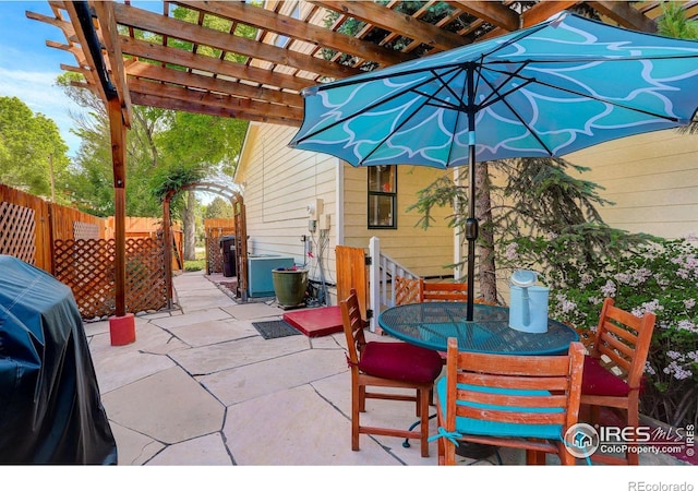 1620 Oak Ave, Boulder, CO 80304 - view of patio featuring a pergola, outdoor dining area, and area for grilling