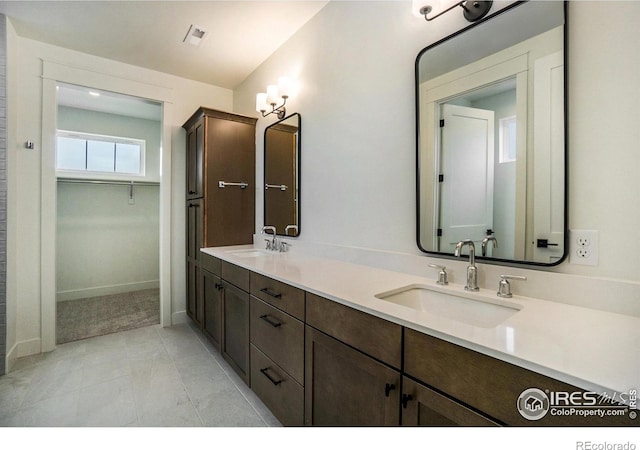 3045 E Trilby Rd Unit B-10, Fort Collins, CO 80528 - full bath with double vanity and a walk in closet