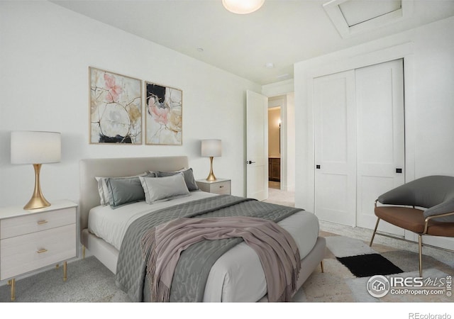 3045 E Trilby Rd Unit B-10, Fort Collins, CO 80528 - bedroom with attic access, a closet, and carpet floors