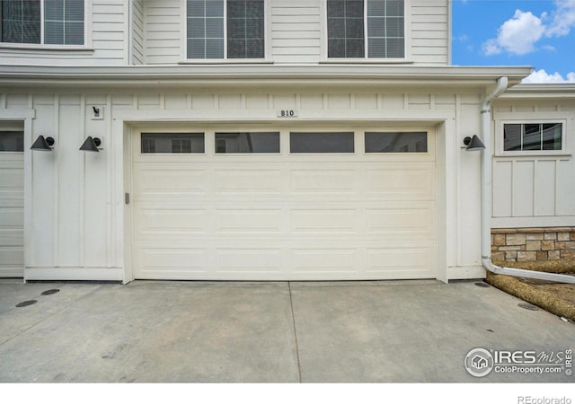 3045 E Trilby Rd Unit B-10, Fort Collins, CO 80528 - garage featuring driveway