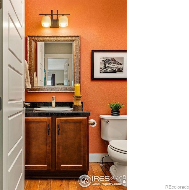 1963 Blue Yonder Way, Fort Collins, CO 80525 - half bath with wood finished floors and vanity