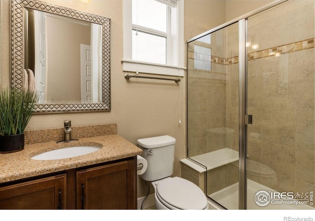 1963 Blue Yonder Way, Fort Collins, CO 80525 - bathroom featuring vanity and a shower stall