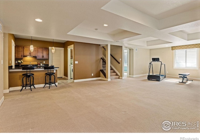 1963 Blue Yonder Way, Fort Collins, CO 80525 - exercise room with light carpet, recessed lighting, healthy amount of natural light, and washer / dryer