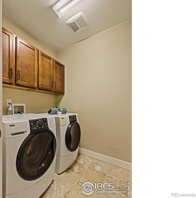 1963 Blue Yonder Way, Fort Collins, CO 80525 - laundry room featuring cabinet space and washer and dryer