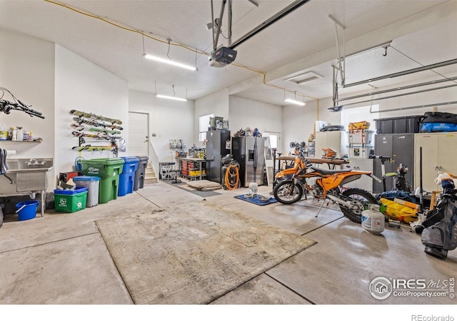 1963 Blue Yonder Way, Fort Collins, CO 80525 - garage featuring a garage door opener
