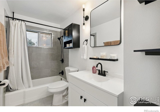 1607 Rushmore Dr, Colorado Springs, CO 80910 - full bathroom with shower / bath combo, vanity, and tile patterned flooring