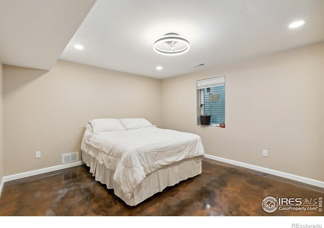 1607 Rushmore Dr, Colorado Springs, CO 80910 - bedroom with recessed lighting and finished concrete floors