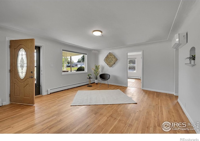 707 E Emma St, Lafayette, CO 80026 - entrance foyer with a baseboard heating unit and wood finished floors