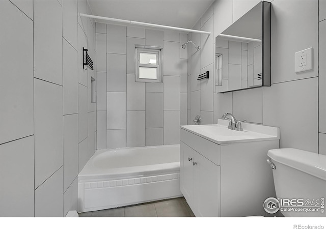 707 E Emma St, Lafayette, CO 80026 - full bath featuring vanity, tub / shower combination, and tile patterned flooring