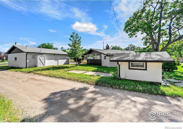 707 E Emma St, Lafayette, CO 80026 - view of front of property with an outbuilding