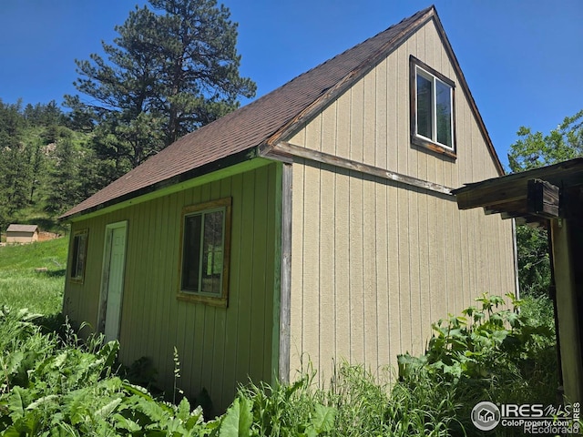 20881 Buckhorn Rd, Bellvue, CO 80512 - view of home's exterior with roof with shingles