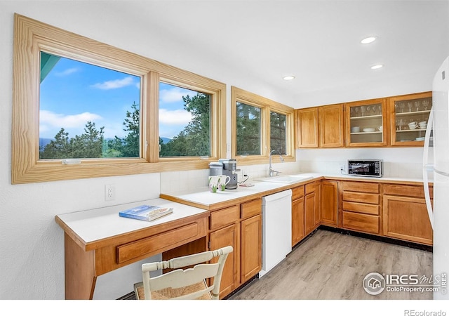 849 Mountain Meadows Rd, Boulder, CO 80302 - kitchen with white appliances, plenty of natural light, light wood-style floors, light countertops, and recessed lighting