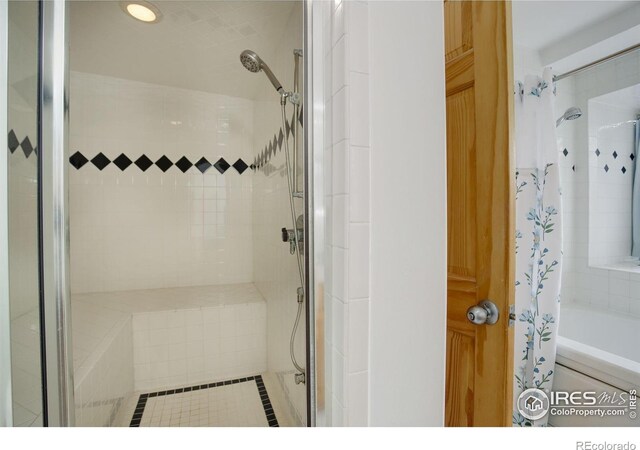 849 Mountain Meadows Rd, Boulder, CO 80302 - full bath with tile patterned floors and tiled shower / bath combo