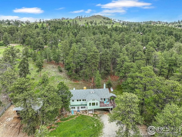 849 Mountain Meadows Rd, Boulder, CO 80302 - view of subject property with a heavily wooded area