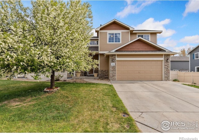 5452 Rustic Ave, Firestone, CO 80504 - view of front facade featuring stone siding and driveway