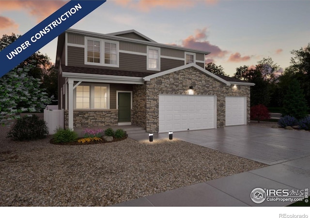 4343 Alderwood Dr, Johnstown, CO 80534 - view of front of property with stone siding, a garage, concrete driveway, and a porch