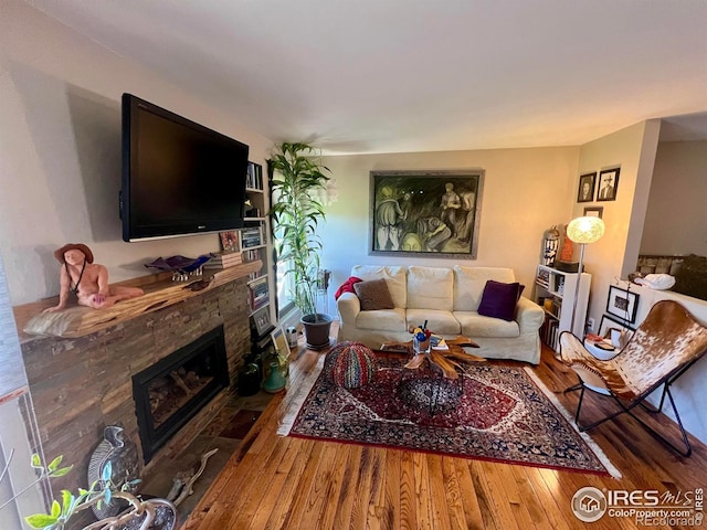 1624 Bradley Ct, Boulder, CO 80305 - living room with hardwood / wood-style flooring and a fireplace