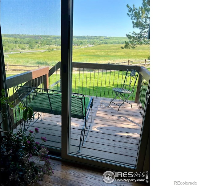 1624 Bradley Ct, Boulder, CO 80305 - wooden terrace featuring a view of countryside