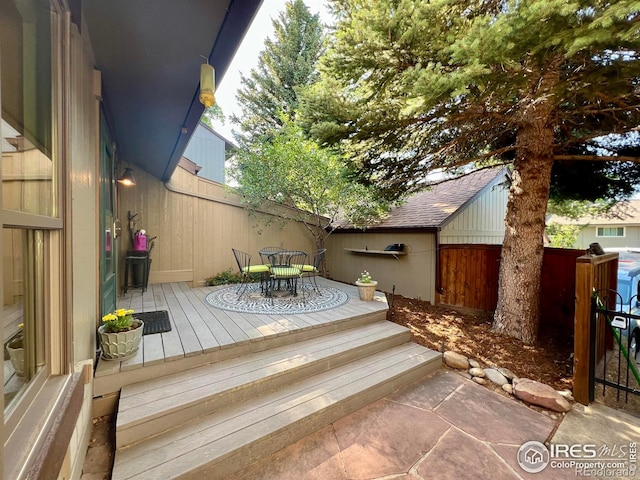 1624 Bradley Ct, Boulder, CO 80305 - wooden deck with outdoor dining space