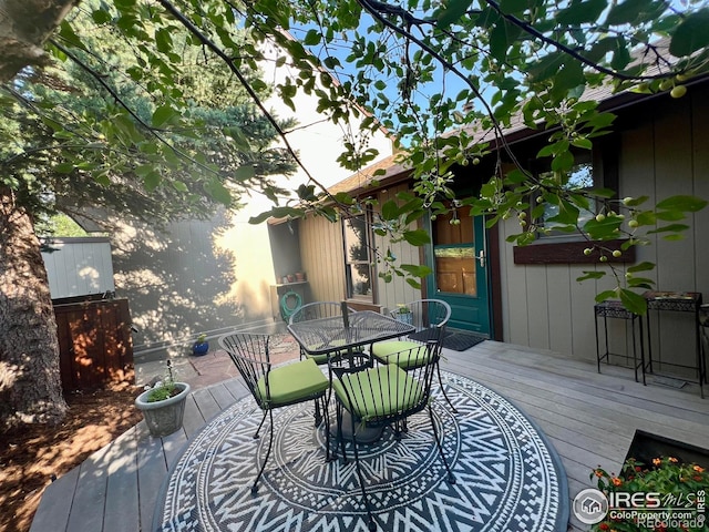 1624 Bradley Ct, Boulder, CO 80305 - wooden deck featuring outdoor dining area