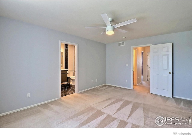3228 Borrossa St, Evans, CO 80634 - unfurnished bedroom featuring carpet floors, ensuite bath, and a ceiling fan