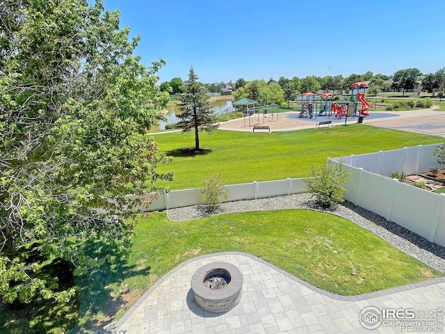3228 Borrossa St, Evans, CO 80634 - fenced backyard with an outdoor fire pit and a patio