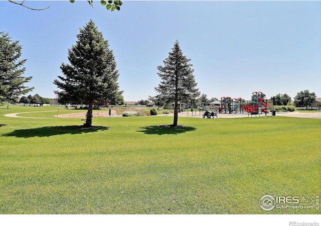 3228 Borrossa St, Evans, CO 80634 - surrounding community with a lawn