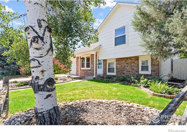 109 Sunflower Dr, Windsor, CO 80550 - view of front of house featuring brick siding
