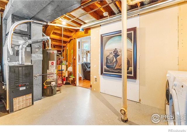 109 Sunflower Dr, Windsor, CO 80550 - below grade area featuring water heater, washing machine and clothes dryer, and heating unit