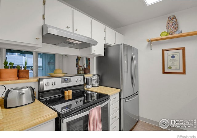 1113 Elysian Field Dr Unit A, Lafayette, CO 80026 - kitchen with appliances with stainless steel finishes, under cabinet range hood, light countertops, white cabinets, and light wood finished floors