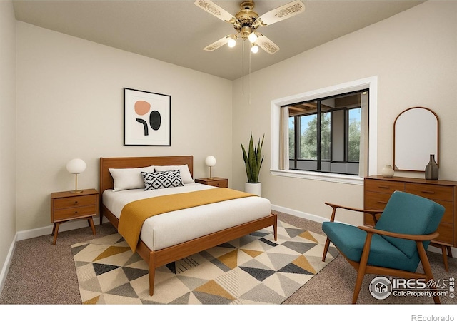 311 12th Ave, Greeley, CO 80631 - bedroom with light carpet and a ceiling fan