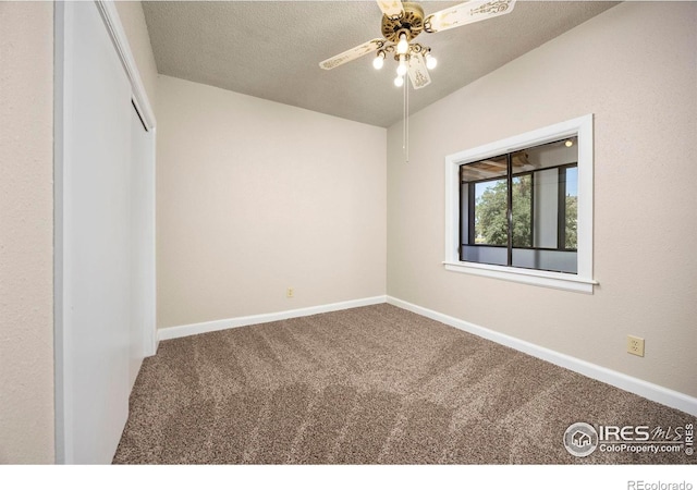 311 12th Ave, Greeley, CO 80631 - unfurnished bedroom with carpet flooring, a textured ceiling, a closet, and ceiling fan