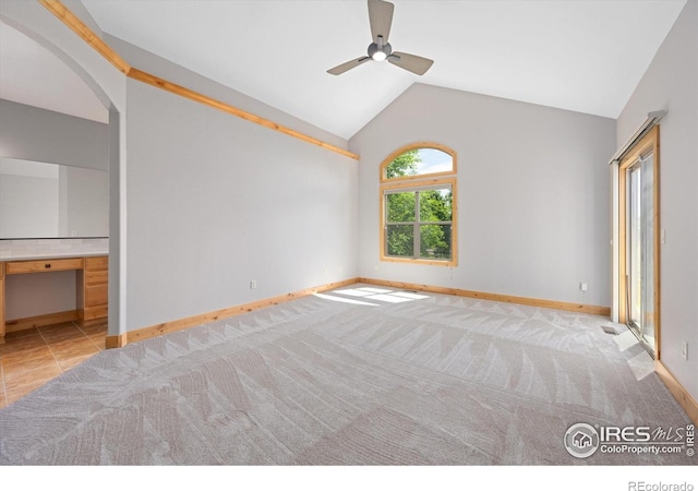 8416 Starfish Ct, Windsor, CO 80528 - unfurnished bedroom with lofted ceiling, arched walkways, ensuite bathroom, carpet floors, and a ceiling fan