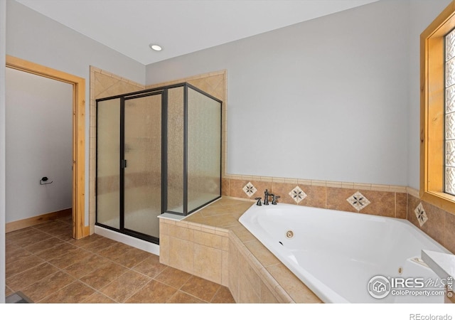 8416 Starfish Ct, Windsor, CO 80528 - bathroom featuring a shower stall, a whirlpool tub, tile patterned floors, and recessed lighting