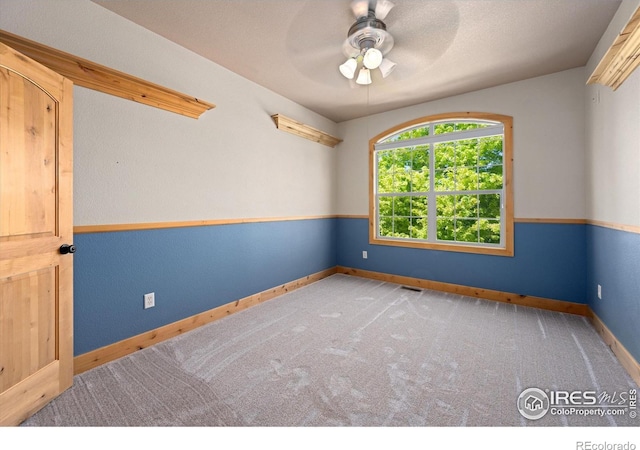 8416 Starfish Ct, Windsor, CO 80528 - carpeted empty room with a ceiling fan and baseboards