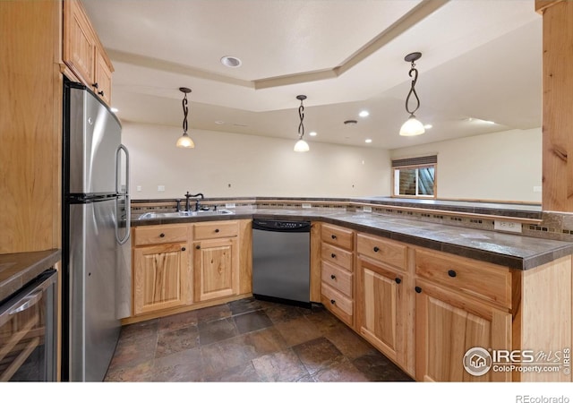 8416 Starfish Ct, Windsor, CO 80528 - kitchen with appliances with stainless steel finishes, wine cooler, tile countertops, dark stone finish floors, and hanging light fixtures