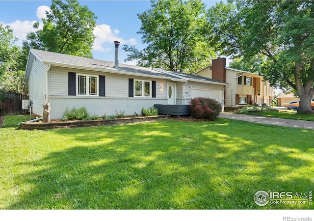 930 Vanderbilt Ct, Fort Collins, CO 80525 - view of front of property with a garage, brick siding, and a chimney