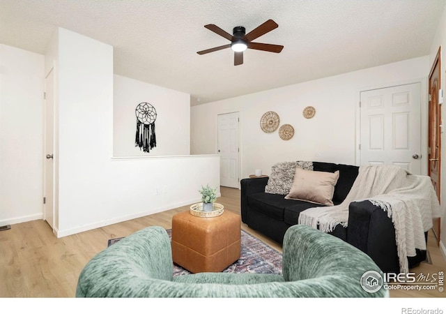 930 Vanderbilt Ct, Fort Collins, CO 80525 - living area featuring a ceiling fan and wood finished floors