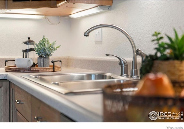930 Vanderbilt Ct, Fort Collins, CO 80525 - kitchen view of a textured wall and light countertops