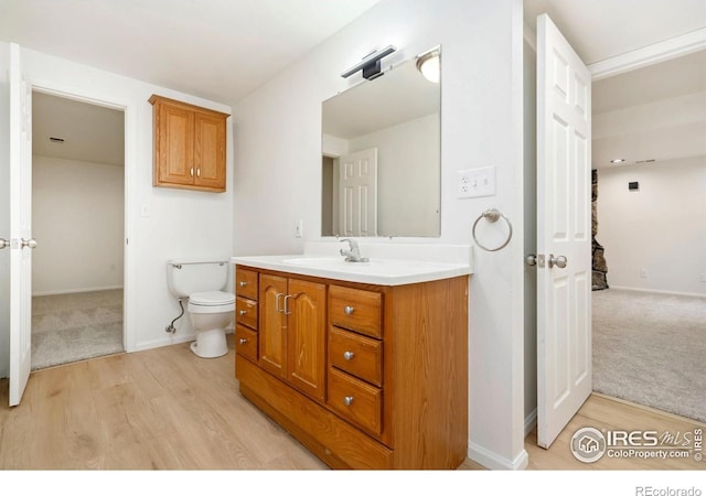 930 Vanderbilt Ct, Fort Collins, CO 80525 - bathroom featuring vanity and wood finished floors