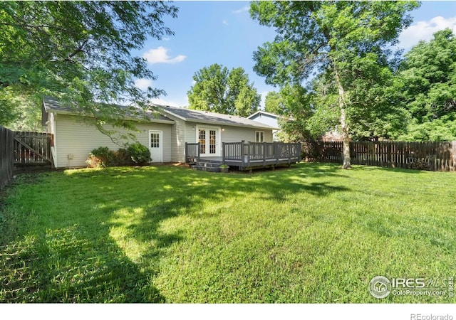 930 Vanderbilt Ct, Fort Collins, CO 80525 - fenced backyard with french doors and a wooden deck