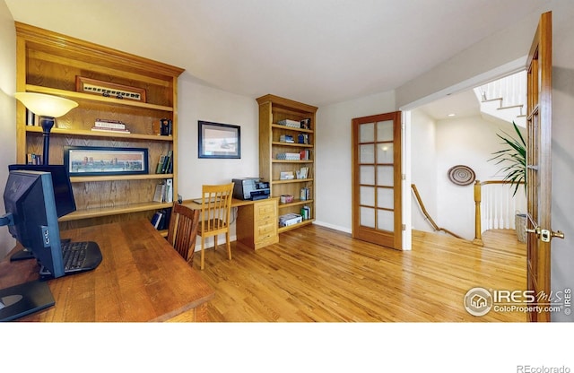 14652 Kalamath Ct, Westminster, CO 80023 - home office with wood finished floors and french doors