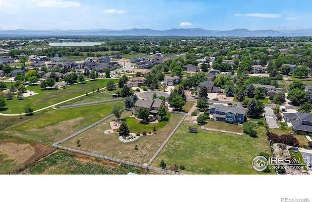 14652 Kalamath Ct, Westminster, CO 80023 - aerial perspective of suburban area with a water and mountain view