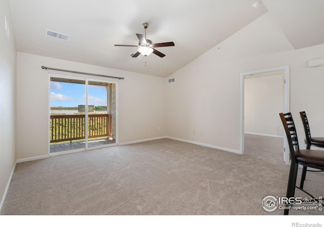 4905 Hahns Peak Dr Unit 202, Loveland, CO 80538 - carpeted spare room featuring vaulted ceiling and a ceiling fan