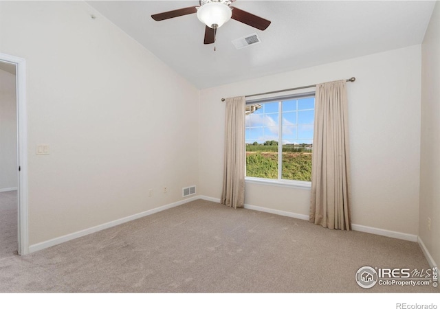 4905 Hahns Peak Dr Unit 202, Loveland, CO 80538 - empty room featuring carpet flooring, vaulted ceiling, and a ceiling fan
