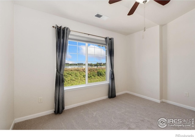 4905 Hahns Peak Dr Unit 202, Loveland, CO 80538 - spare room with carpet and a ceiling fan